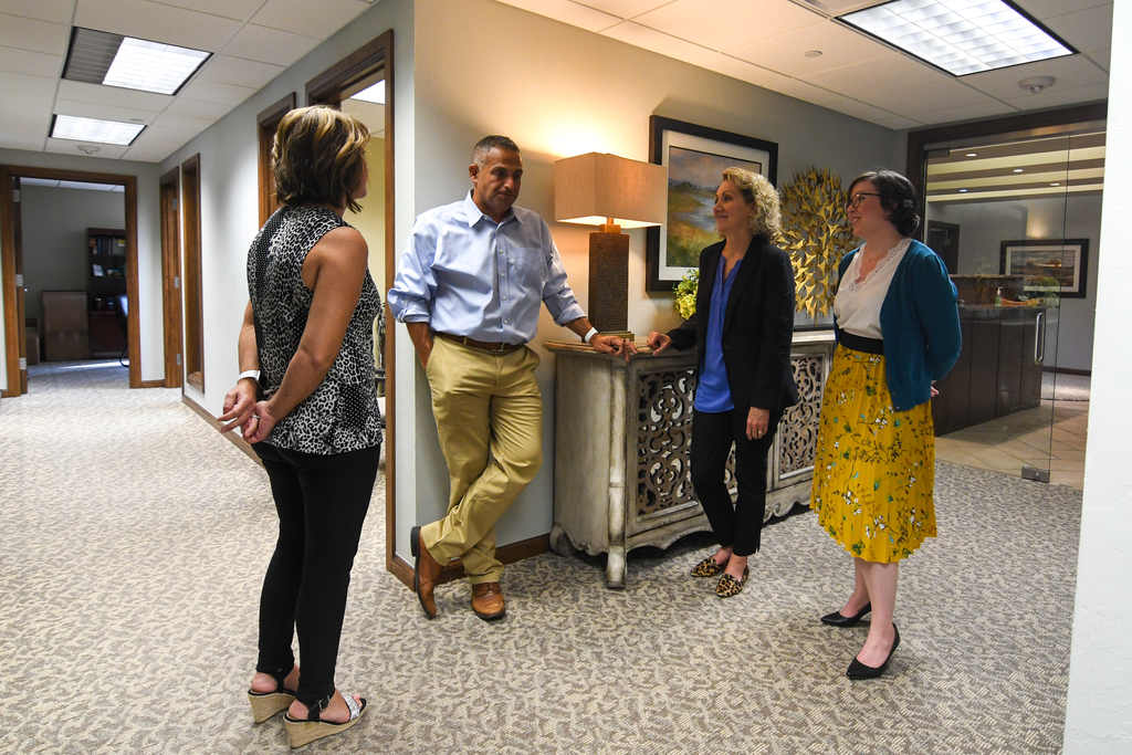 Staff gathered around front desk