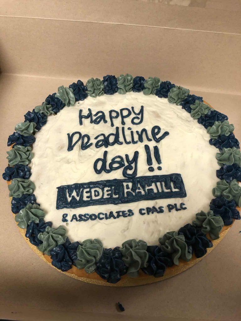 frosted cookie that says happy deadline day - Oct. 15